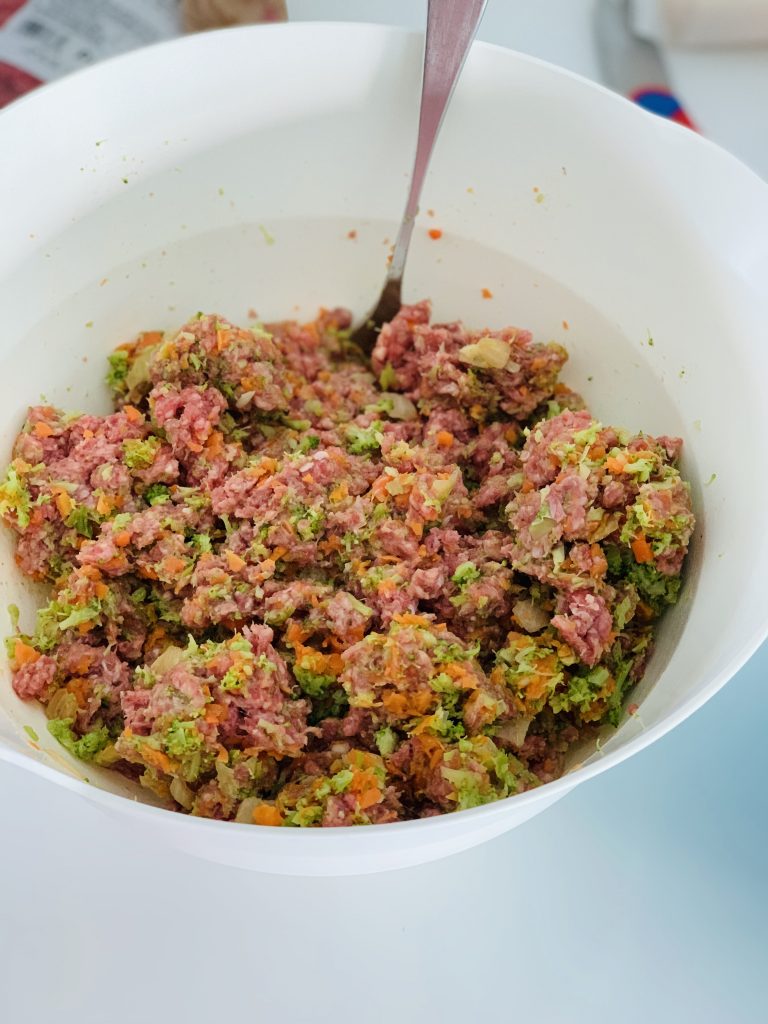 Ground meat mixed with finely chopped carrots, broccoli and cauliflower
