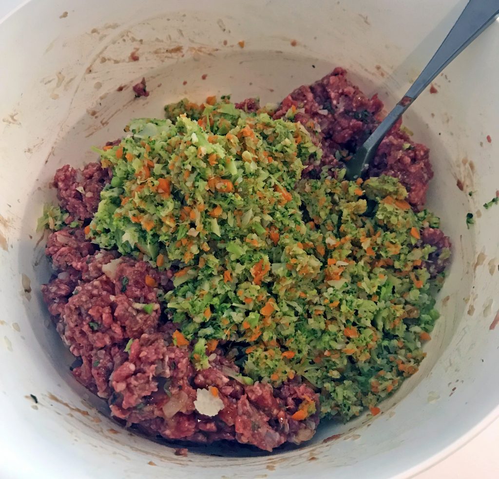 Ground meat mixed with finely chopped carrots, broccoli and cauliflower